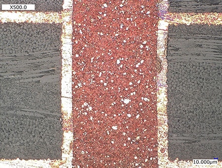 Observation of discoloured areas on a PCB cross section (500x)